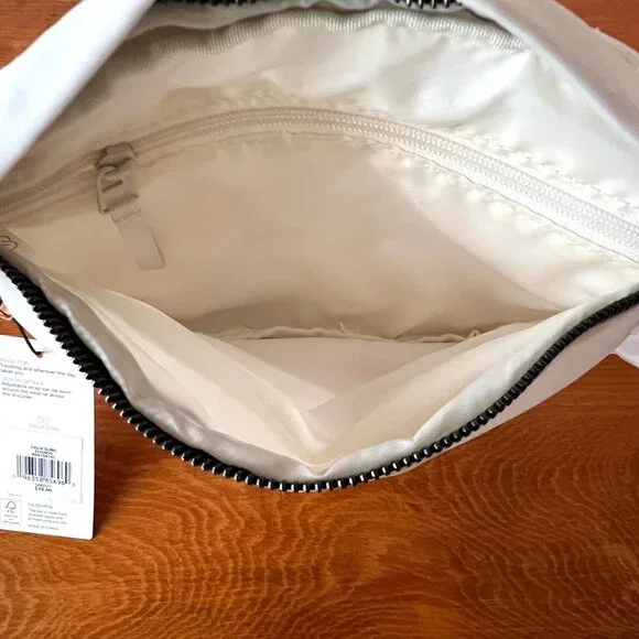 New Calia Sling Bag, Fanny Pack, or Crossbody, Eggnog White, RN# 104141 - Picture 7 of 11